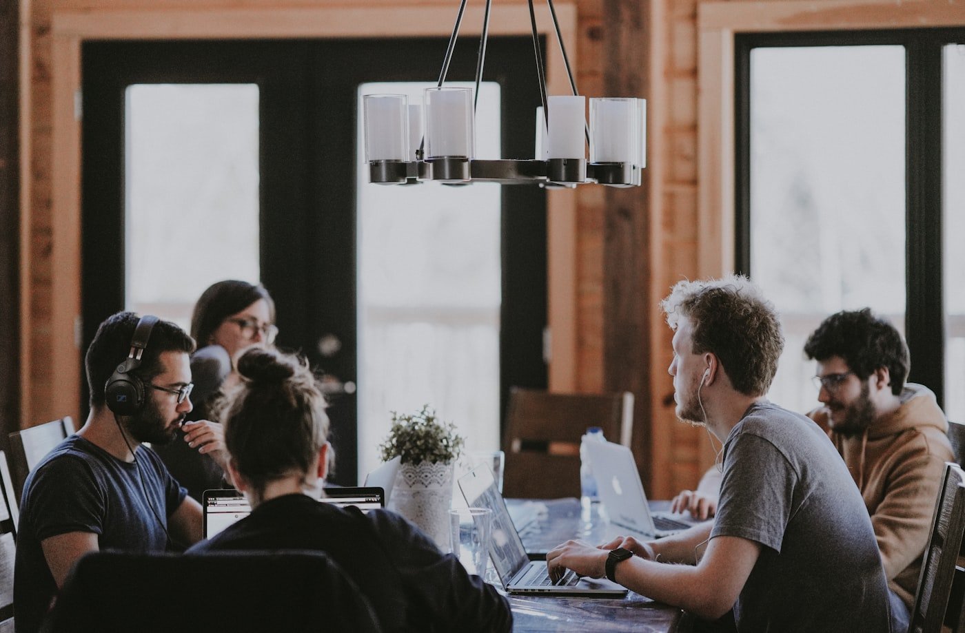 Advisors collaborating at Triple Eight